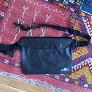 NEW never used Black waterproof Fanny pack with interior seal and Velcro